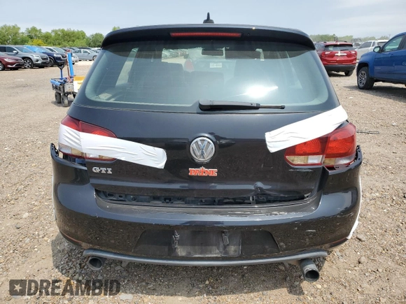 2013 Volkswagen GTI Driver's Edition z VIN WVWHV7AJXDW139382, wystawiony jako Copart lot #52128055 z przebiegiem 78 233 mil mil oraz Szkoda całkowita • Salvage title. Historia ofert i sprzedaży dostępna na DreamBid. Obrazek 6.