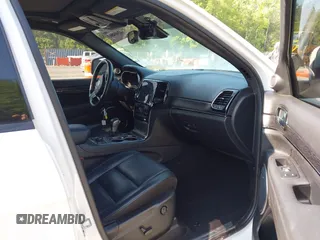 2021 Jeep Grand Cherokee Overland with VIN 1C4RJFCG3MC502165, listed as a IAAI auction lot 42404863 with 100,197 mi miles and . Bid and sale history available at DreamBid. Image 5.