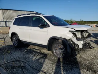 2024 Honda Passport TrailSport with VIN 5FNYF8H62RB004333, listed as a Copart auction lot 52573545 with 10,235 mi miles and Salvage title. Bid and sale history available at DreamBid. Image 4.