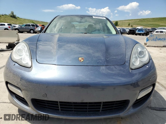 2010 Porsche Panamera Turbo with VIN WP0AC2A70AL090897, listed as a Copart auction lot 60986335 with 120,334 mi miles and Salvage title. Bid and sale history available at DreamBid. Image 5.