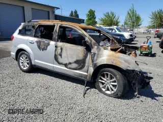 2014 Dodge Journey SXT z VIN 3C4PDDBG3ET178595, wystawiony jako Copart lot #56893275 z przebiegiem Nie podano mil oraz Szkoda całkowita • Salvage title. Historia ofert i sprzedaży dostępna na DreamBid. Obrazek 4.