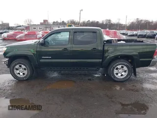 2013 Toyota Tacoma with VIN 3TMLU4EN3DM123470, listed as a IAAI auction lot 41952721 with 72,296 mi miles and . Bid and sale history available at DreamBid. Image 14.