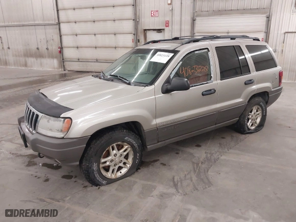 2003 Jeep Grand Cherokee Laredo with VIN 1J4GW48SX3C544237, listed as a IAAI auction lot 40823228 with 1 mi miles. Bid and sale history available at carsss.com. Image 2.