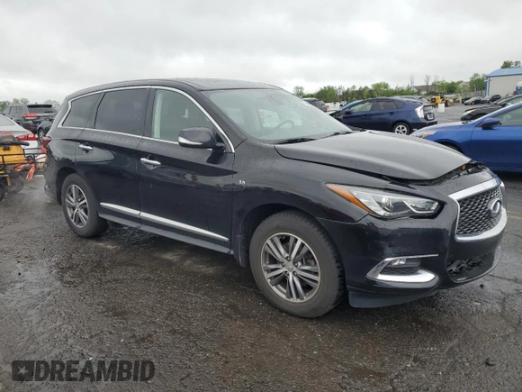 2020 Infiniti QX60 Pure with VIN 5N1DL0MM8LC517826, listed as a Copart auction lot 56527385 with 83,767 mi miles and Salvage title. Bid and sale history available at DreamBid. Image 4.