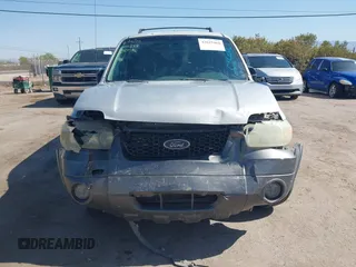 2006 Ford Escape XLT z VIN 1FMCU93136KC15231, wystawiony jako IAAI lot #42625410 z przebiegiem 117 479 mil mil oraz . Historia ofert i sprzedaży dostępna na DreamBid. Obrazek 6.