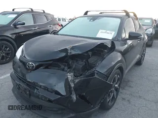 2019 Toyota C-HR XLE with VIN JTNKHMBXXK1034717, listed as a IAAI auction lot 41939078 with 56,309 mi miles. Bid and sale history available at carsss.com. Image 2.
