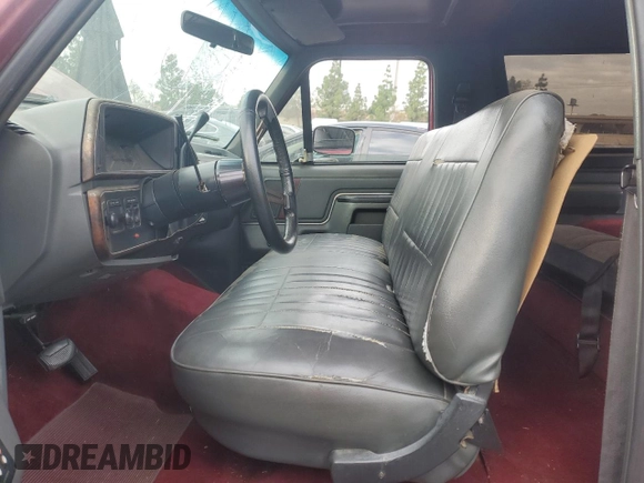 1991 Ford Bronco Custom with VIN 1FMEU15H0MLA44126, listed as a Copart auction lot 82401324 with 79,550 mi miles and Salvage Title. Bid and sale history available at DreamBid. Image 7.