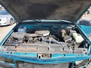 1995 GMC Sierra 1500 with VIN 1GTGC29N5SE541812, listed as a Copart auction lot 72408103 with 193,899 mi miles and Salvage Title. Bid and sale history available at DreamBid. Image 11.