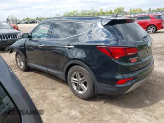 2018 Hyundai Santa Fe 2.4L z VIN 5NMZUDLB2JH058032, wystawiony jako IAAI lot #42206116 z przebiegiem 138 688 mil mil oraz . Historia ofert i sprzedaży dostępna na DreamBid. Obrazek 3.