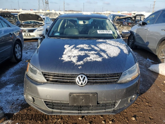 2014 Volkswagen Jetta SEL z VIN 3VWL17AJ6EM438176, wystawiony jako Copart lot #85081294 z przebiegiem 108 420 mil mil oraz Szkoda całkowita • Salvage title. Historia ofert i sprzedaży dostępna na DreamBid. Obrazek 5.