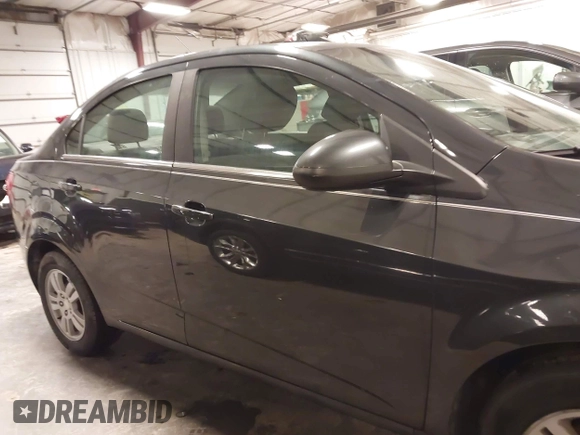 2015 Chevrolet Sonic LT with VIN 1G1JC5SH4F4163515, listed as a IAAI auction lot 41962147 with 133,104 mi miles and . Bid and sale history available at DreamBid. Image 14.