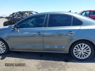 2011 Volkswagen Jetta SEL with VIN 3VWLZ7AJ4BM023877, listed as a IAAI auction lot 42054594 with 103,680 mi miles and . Bid and sale history available at DreamBid. Image 14.