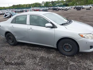 2010 Toyota Corolla with VIN JTDBU4EE7AJ056666, listed as a IAAI auction lot 42308938 with 156,192 mi miles and . Bid and sale history available at DreamBid. Image 6.