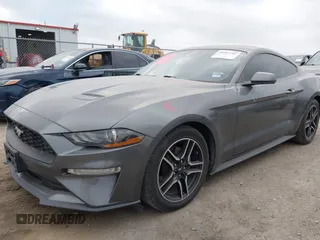 2021 Ford Mustang EcoBoost with VIN 1FA6P8TH0M5115864, listed as a IAAI auction lot 42287791 with 94,842 mi miles and . Bid and sale history available at DreamBid. Image 2.