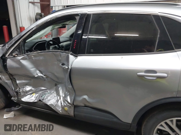 2021 Ford Escape SEL with VIN 1FMCU9H67MUA94970, listed as a IAAI auction lot 42317086 with 51,769 mi miles and . Bid and sale history available at DreamBid. Image 14.