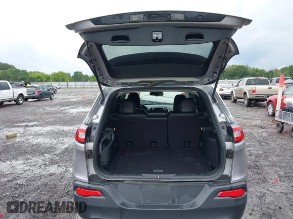 2018 Jeep Cherokee Latitude Plus with VIN 1C4PJLLB9JD590607, listed as a IAAI auction lot 42489554 with 168,116 mi miles and . Bid and sale history available at DreamBid. Image 17.