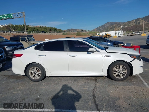 2016 Kia Optima LX z VIN 5XXGT4L34GG049312, wystawiony jako IAAI lot #41890581 z przebiegiem 142 360 mil mil oraz . Historia ofert i sprzedaży dostępna na DreamBid. Obrazek 12.