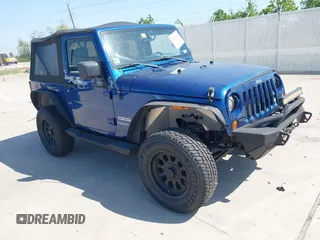 2010 Jeep Wrangler Sport with VIN 1J4AA2D11AL117404, listed as a IAAI auction lot 42012340 with 266,310 mi miles and . Bid and sale history available at carsss.com. Image 1.