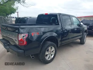 2015 Ford F-150 XLT with VIN 1FTEW1EG4FFC91835, listed as a IAAI auction lot 42126301 with 142,733 mi miles. Bid and sale history available at carsss.com. Image 4.