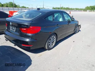 2014 BMW 3 Series GT 328i xDrive with VIN WBA3X5C51ED557347, listed as a IAAI auction lot 42028680 with 178,469 mi miles. Bid and sale history available at carsss.com. Image 4.