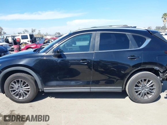2019 Mazda CX-5 Sport with VIN JM3KFABM7K1579747, listed as a IAAI auction lot 41965097 with 151,042 mi miles and . Bid and sale history available at DreamBid. Image 15.