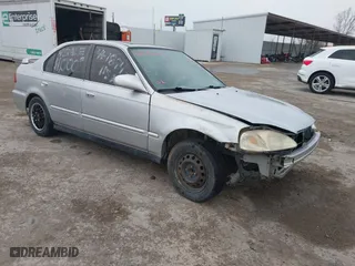 1999 Honda Civic EX with VIN 1HGEJ8649XL023282, listed as a IAAI auction lot 41496406 with 229,003 mi miles. Bid and sale history available at carsss.com. Image 1.