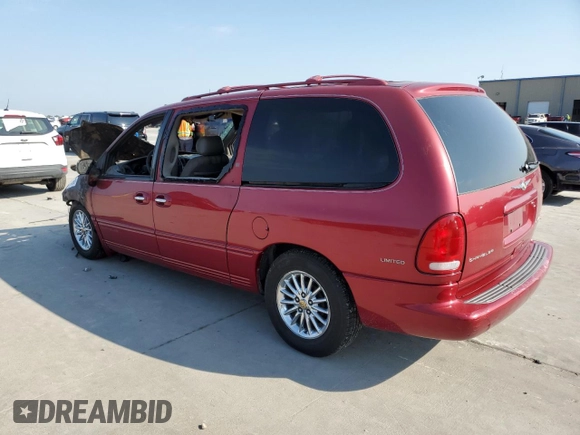 1999 Chrysler Town & Country LXi with VIN 1C4GP64L0XB536320, listed as a Copart auction lot 74194134 with Not Provided miles and Salvage Title. Bid and sale history available at carsss.com. Image 2.