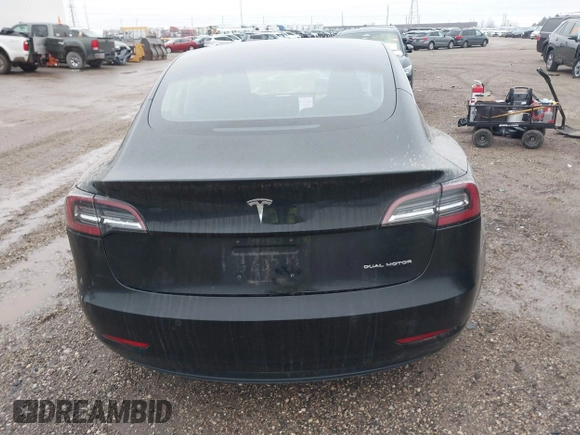 2018 Tesla Model 3 Long Range Battery with VIN 5YJ3E1EB1JF127289, listed as a IAAI auction lot 41484253 with 60,577 mi miles and . Bid and sale history available at DreamBid. Image 16.