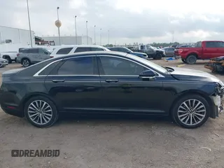 2018 Lincoln MKZ Select z VIN 3LN6L5C93JR620170, wystawiony jako IAAI lot #41488730 z przebiegiem 101 040 mil mil oraz . Historia ofert i sprzedaży dostępna na DreamBid. Obrazek 14.