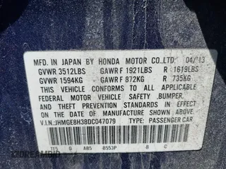 2013 Honda Fit with VIN JHMGE8H38DC047079, listed as a IAAI auction lot 42037073 with 32,794 mi miles. Bid and sale history available at carsss.com. Image 9.