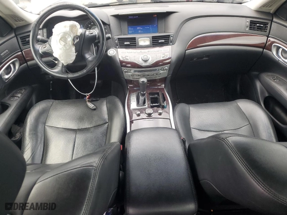 2013 Infiniti M37 with VIN JN1BY1AR4DM601451, listed as a Copart auction lot 65723894 with 129,872 mi miles and Clean Title. Bid and sale history available at carsss.com. Image 8.