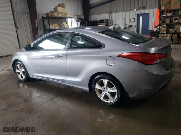 2013 Hyundai Elantra Coupe GS PZEV with VIN KMHDH6AE5DU011822, listed as a Copart auction lot 71594744 with 100,477 mi miles and Salvage Title. Bid and sale history available at carsss.com. Image 2.