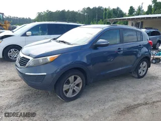 2012 Kia Sportage LX with VIN KNDPB3A27C7320227, listed as a IAAI auction lot 42109588 with 162,043 mi miles. Bid and sale history available at carsss.com. Image 2.