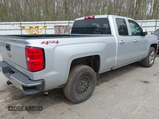 2016 Chevrolet Silverado 1500 LT with VIN 1GCVKREC1GZ228201, listed as a IAAI auction lot 42136420 with 112,101 mi miles and . Bid and sale history available at DreamBid. Image 4.