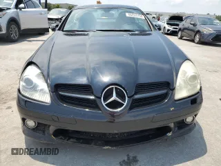 2007 Mercedes-Benz SLK-Class 3.0L with VIN WDBWK54F57F157433, listed as a Copart auction lot 66233794 with 104,198 mi miles and Salvage Title. Bid and sale history available at carsss.com. Image 5.
