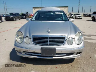 2005 Mercedes-Benz E 5.0L with VIN WDBUF70J95A718132, listed as a Copart auction lot 51620185 with 249,876 mi miles and Salvage Title. Bid and sale history available at carsss.com. Image 5.