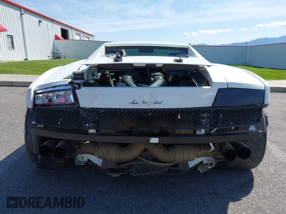 2009 Lamborghini Gallardo z VIN ZHWGU54T59LA07777, wystawiony jako IAAI lot #39749159 z przebiegiem 8730 mil mil oraz . Historia ofert i sprzedaży dostępna na DreamBid. Obrazek 17.