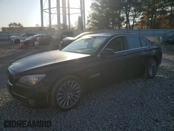 2011 BMW 7 Series 740i with VIN WBAKA4C50BC613111, listed as a Copart auction lot 78597934 with 103,778 mi miles and Salvage Title. Bid and sale history available at carsss.com. Image 1.