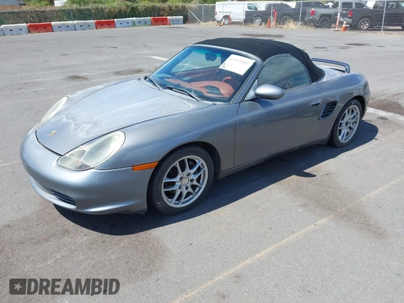 2003 Porsche Boxster with VIN WP0CA29893U621152, listed as a IAAI auction lot 42533307 with 70,106 mi miles and . Bid and sale history available at DreamBid. Image 2.