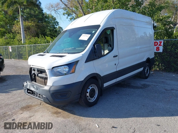 2020 Ford Transit Cargo with VIN 1FTBW1X82LKB49009, listed as a IAAI auction lot 41527513 with 52,802 mi miles and . Bid and sale history available at DreamBid. Image 2.