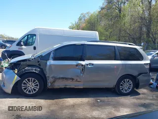2015 Toyota Sienna XLE with VIN 5TDYK3DC0FS558486, listed as a IAAI auction lot 42064281 with 211,119 mi miles and . Bid and sale history available at DreamBid. Image 15.