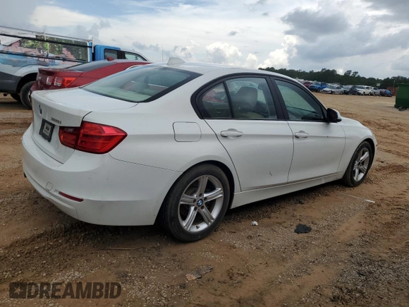 2014 BMW 3 Series 328i with VIN WBA3A5C59EP601899, listed as a Copart auction lot 61430675 with 205,396 mi miles and Salvage title. Bid and sale history available at DreamBid. Image 3.