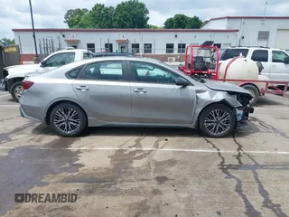 2023 Kia Forte GT-Line z VIN 3KPF54AD3PE641178, wystawiony jako IAAI lot #42114495 z przebiegiem 14 032 mil mil oraz . Historia ofert i sprzedaży dostępna na DreamBid. Obrazek 13.