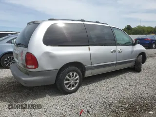 2000 Chrysler Voyager SE z VIN 1C4GJ44G5YB803736, wystawiony jako Copart lot #69868004 z przebiegiem 94 549 mil mil oraz Czysty tytuł • Clean title. Historia ofert i sprzedaży dostępna na DreamBid. Obrazek 3.