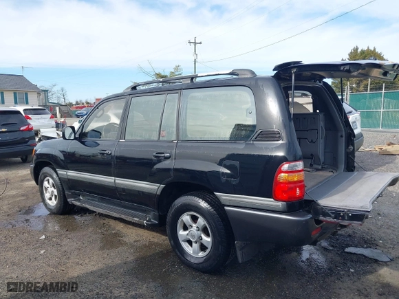 1998 Toyota Land Cruiser with VIN JT3HT05J2W0017214, listed as a IAAI auction lot 41716028 with 214,047 mi miles. Bid and sale history available at carsss.com. Image 3.