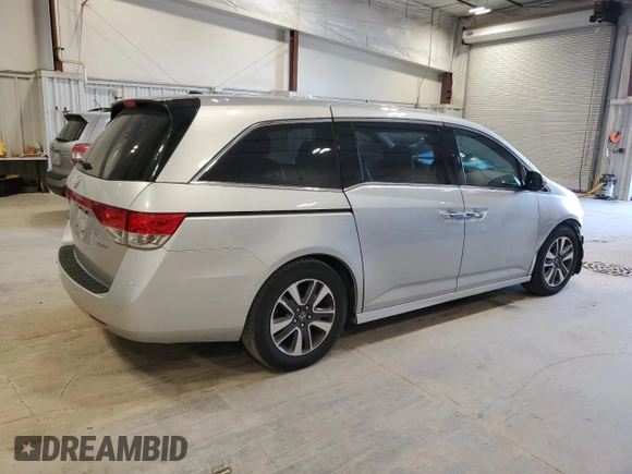 2014 Honda Odyssey Touring with VIN 5FNRL5H97EB005977, listed as a Copart auction lot 53849025 with 229,915 mi miles and Non Repairable. Bid and sale history available at DreamBid. Image 3.