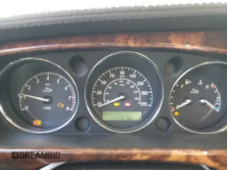 2005 Jaguar XJ VDP with VIN SAJWA82C65SG42753, listed as a Copart auction lot 73792534 with 141,936 mi miles and Salvage Title. Bid and sale history available at carsss.com. Image 9.