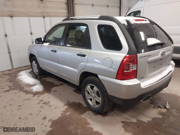 2009 Kia Sportage LX with VIN KNDJE723097571708, listed as a IAAI auction lot 41494118 with 140,869 mi miles. Bid and sale history available at carsss.com. Image 3.
