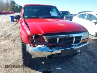 1999 Ford Ranger XL with VIN 1FTZR15V2XTA07631, listed as a IAAI auction lot 41591752 with 179,967 mi miles. Bid and sale history available at carsss.com. Image 6.