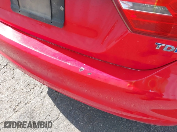 2014 Volkswagen Jetta TDI w/Premium with VIN 3VWLL7AJ8EM372627, listed as a IAAI auction lot 42418054 with 119,926 mi miles and . Bid and sale history available at DreamBid. Image 6.